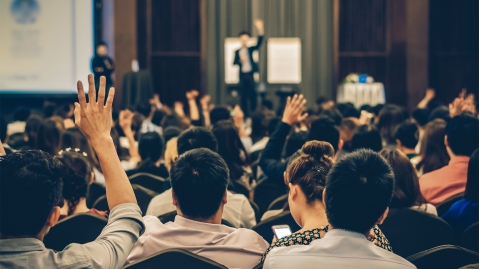 Picture of people attending a conference